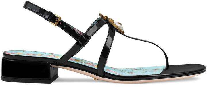 Patent leather sandal with bee