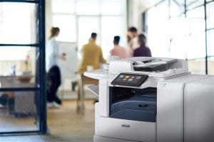 Xerox printer with touch screen and people in the background of a bright office | XBC Business Centre
