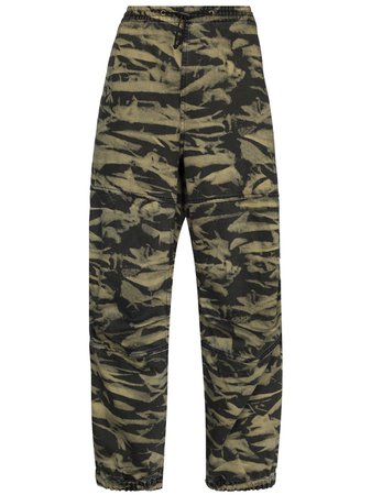 Shop Alexander Wang motif-print track pants with Express Delivery - FARFETCH