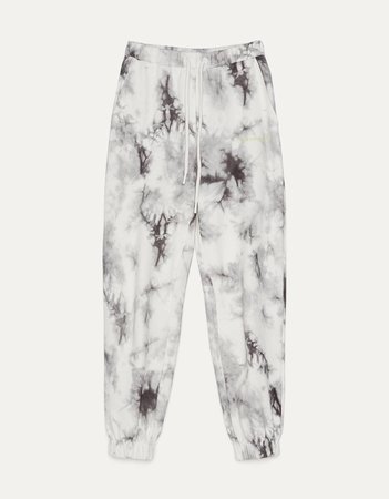 Sweatpants with a tie-dye print - Pants - Woman | Bershka