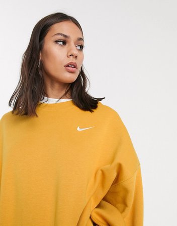 Nike mini swoosh oversized boxy sweatshirt in yellow | ASOS