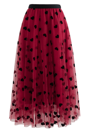 red skirt with black hearts