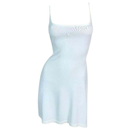 *clipped by @luci-her* 1990's Dolce and Gabbana Semi-Sheer Plunging Ivory Knit Mini Dress For Sale at 1stDibs