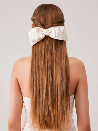 long brown hair with white bow