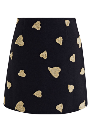 black skirt with beige hearts