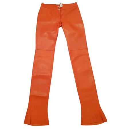 dolce & gabbana orange leather pants