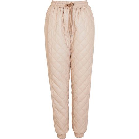 Pink faux leather quilted joggers | River Island