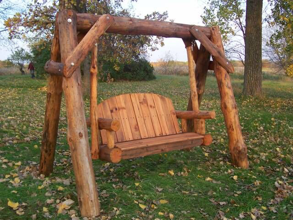 wooden log swinging bench outdoor