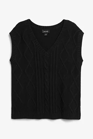 Cable knit vest - Black - Knitted tops - Monki WW