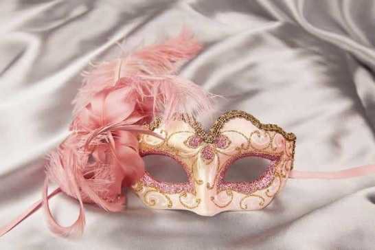 pink feathered mask
