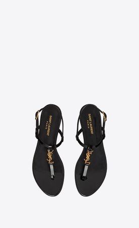Cassandra flat sandals in patent leather with gold-tone monogram | Saint Laurent | YSL.com