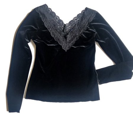 Vintage black velvet long sleeved top with a lace vneck. 30% - Depop
