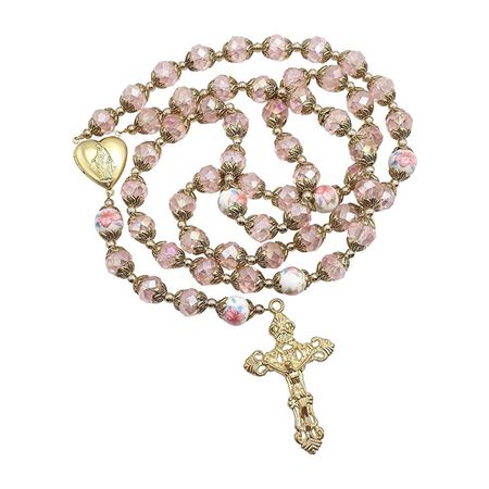 Handmade Gold Plated Catholic Rosary Necklace Total Length Of 20″. Beautiful 9mm Crystallized Beads With Round Pink Flower Beads Made Of Ceramic. Golden 1.6″ Cross Made Of Zinc And Coated With Gold, Preventing Corrosion, Assure Durability For Years.