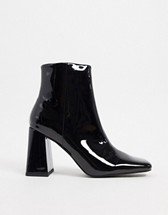 RAID Lorina heeled ankle boots in black | ASOS