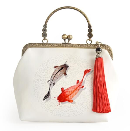white fish print clutch bag