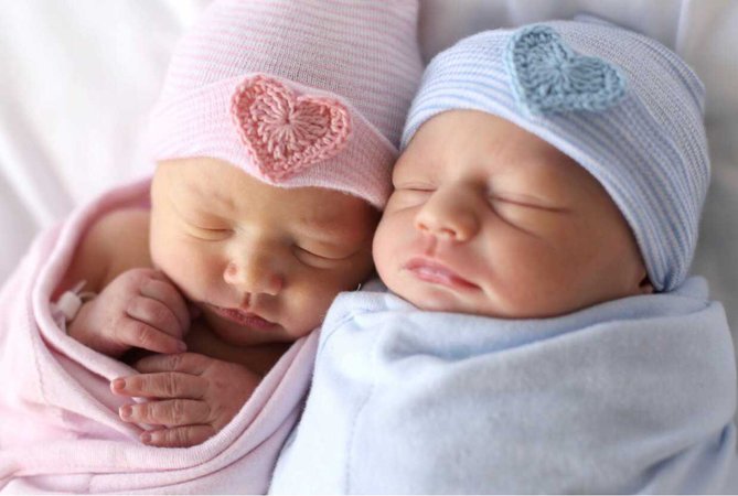 newborn twins (boy and girl)