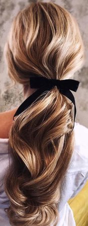hair with black ribbon