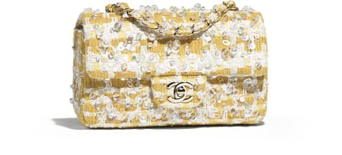 https://www.chanel.com/en_US/fashion/p/hdb/a69900y83507/a69900y83507me576/mini-flap-bag-embroidered-tweed-goldtone-metal-yellow-white.html