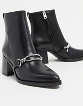 ASOS DESIGN Ava leather loafer boot with chain trim in black | ASOS
