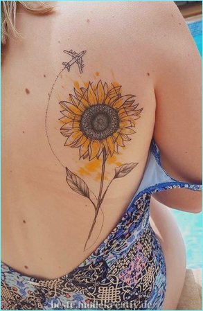 Sunflower and plane tattoo