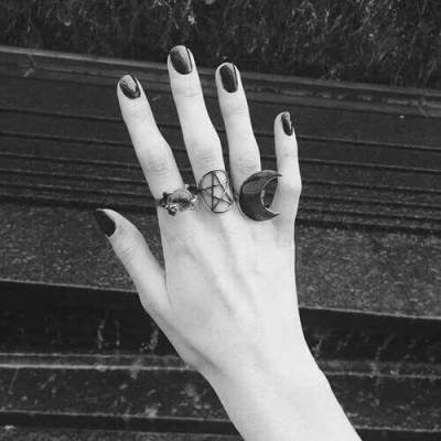 black rings on hand goth