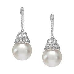 White South Sea Pearl Diamond Gold Drop Earrings at 1stDibs | 18kt white gold and diamond seaquin dangle earrings with south sea pearl drops
