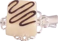 white chocolate hair clip with drizzle