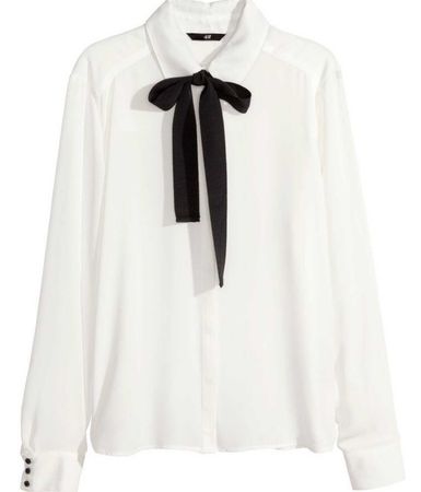 White blouse with black bow