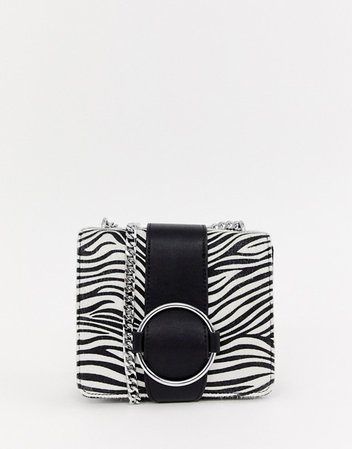 Skinnydip faux Zebra cross body bag with chain detail | ASOS