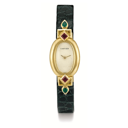 gold vintage watch with dark green croc leather straps