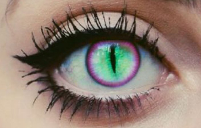 green and purple slitted eye