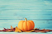 Pumpkin And Autumn Leafs Stock Photo & More Pictures of Autumn | iStock