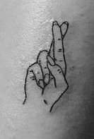 crossed fingers tattoo