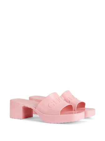 Shop pink Gucci logo embossed sandals with Express Delivery - Farfetch