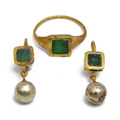 green medieval earrings and ring