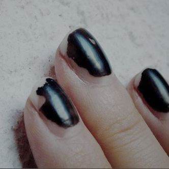 chipped black nail polish