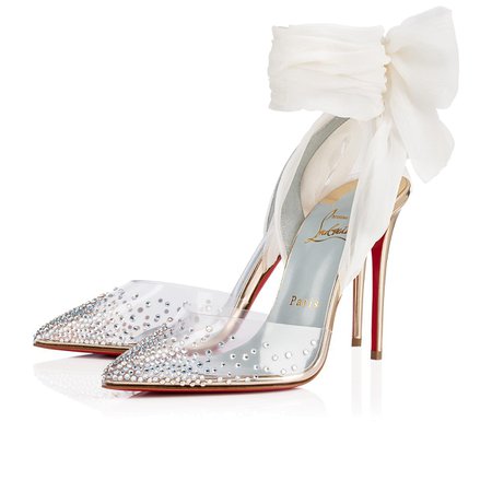 Clear pointed toe pump with rhinestones and white bow