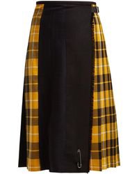 Lyst - Miu Miu Pleated Tartan Wool Patched Mini Skirt in Yellow