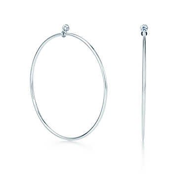 Elsa Peretti® Diamond Hoop earrings in sterling silver with diamonds, medium. | Tiffany & Co.