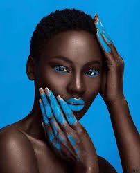 model with ligh blue background and dark skin - Google Search