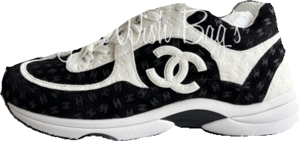 white and black Chanel sneakers