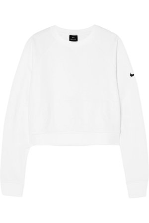Nike | Pro Versa cropped embossed jersey sweatshirt | NET-A-PORTER.COM