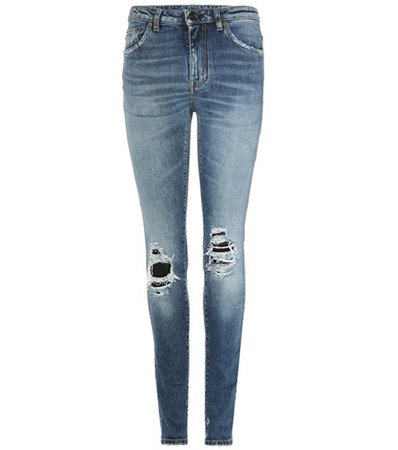 Distressed skinny jeans with leather