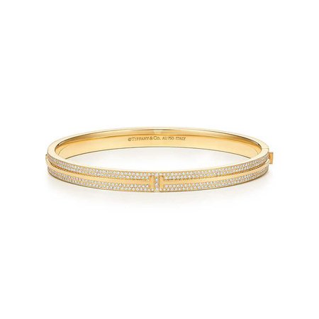 Tiffany T Two hinged bangle in 18k gold with pavé diamonds, medium. | Tiffany & Co.