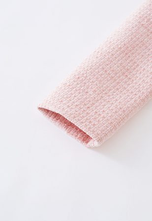 Pastel pink tweed blazer arm close up (your welcome x)