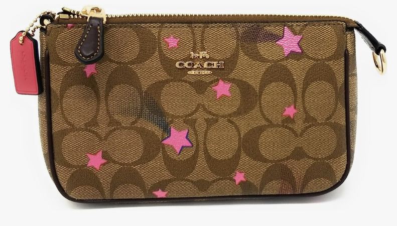 brown coach bag with pink shooting stars