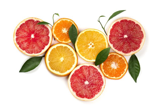 Premium Photo | Citrus fruits isolated on white. pieces of lemon, pink grapefruit and orange