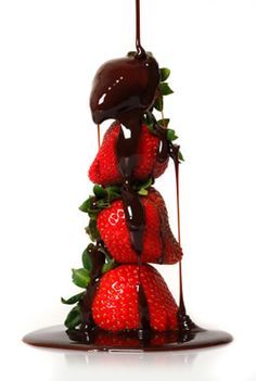 chocolate dripping strawberries