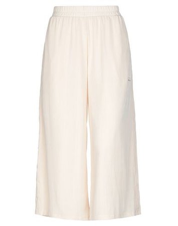 Shop Adidas Originals Cropped Pants & Culottes In Ivory