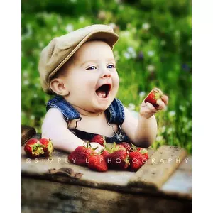 little boy with strawberries